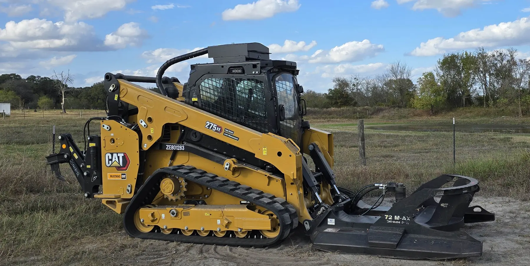 CHB skid steer and brush cutter used for property clearing