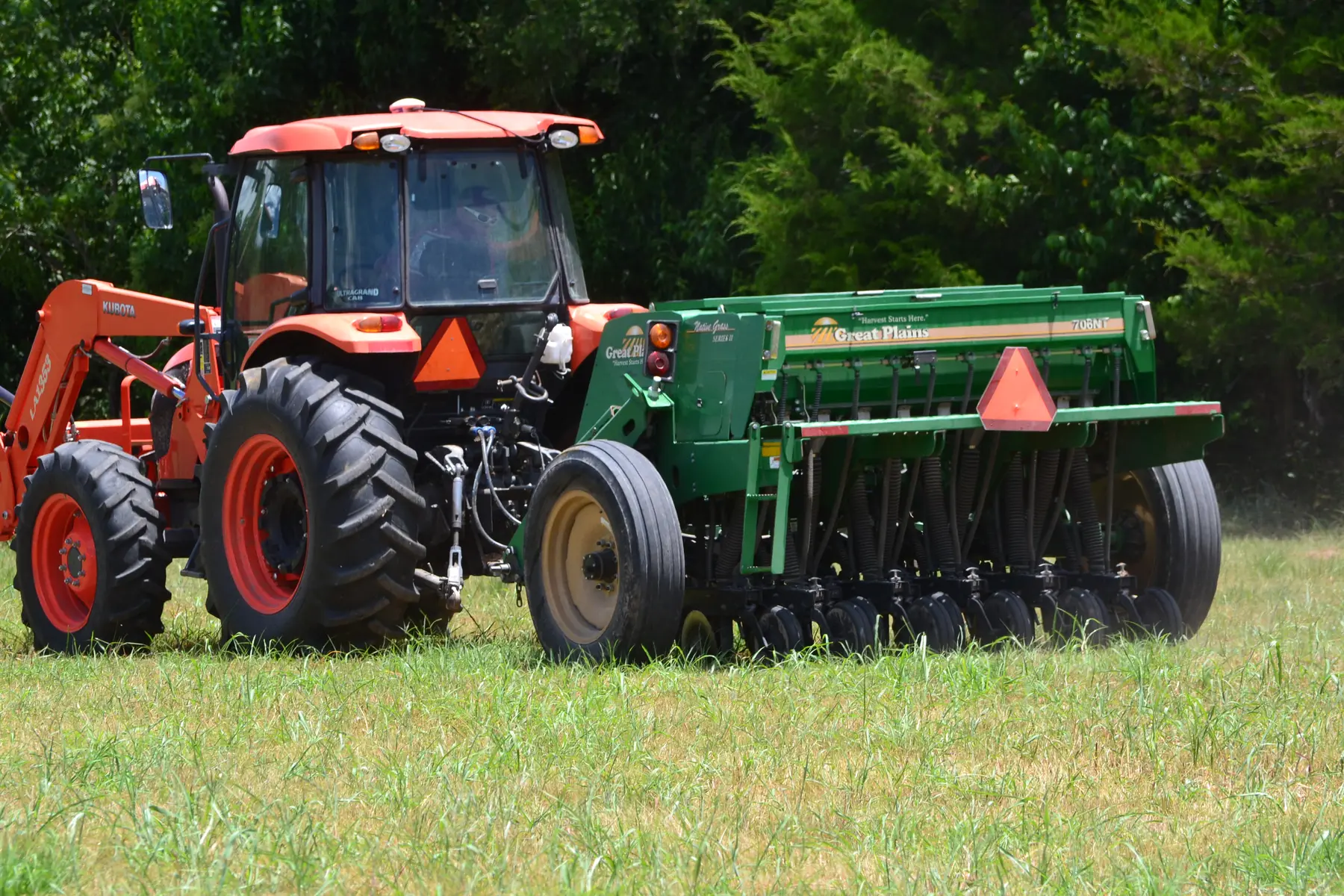 CHB tractor and no-till drill used for pasture planting